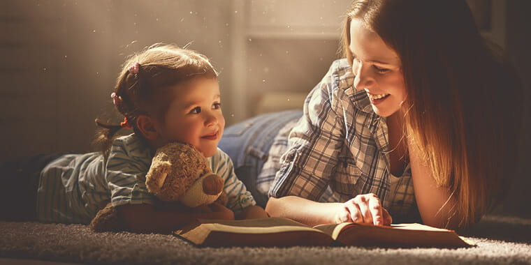 Mother and child reading a book